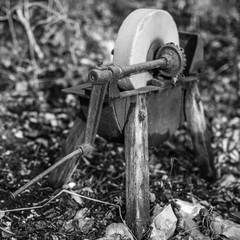 Traditional grinding stone system in black and white.