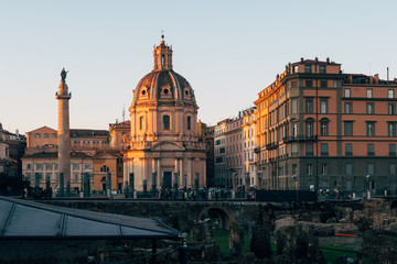 Obraz premium Rome, Italy - Jan 1, 2020: View across the ancient ruins of Trajan's Forum towards Trajan's Column and the Santa Maria di Loreto church in Rome, Italy
