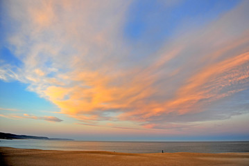Fototapeta na wymiar Amazing sunset on the beach of Nazare