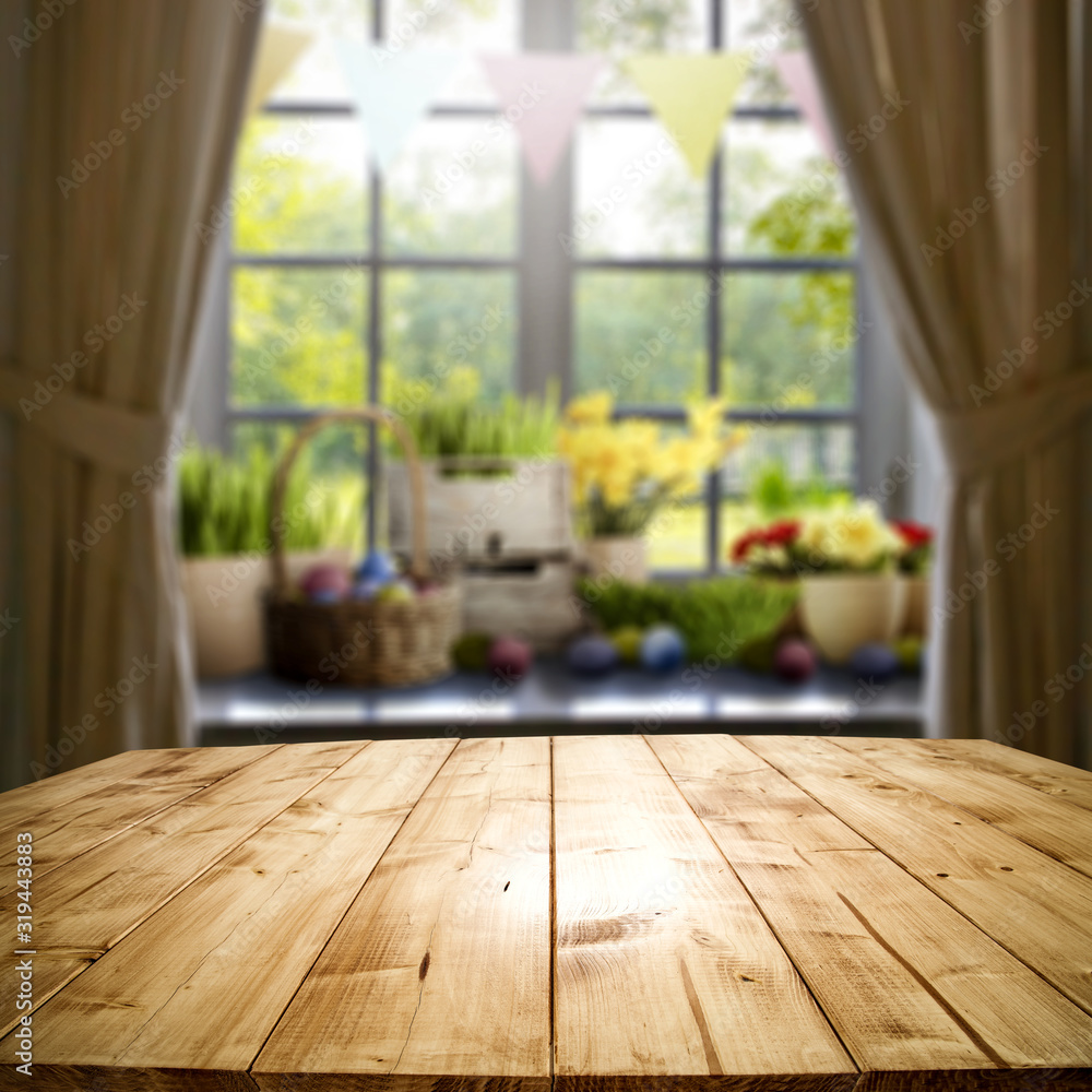 Wall mural table background of free space and white window background of spring time.