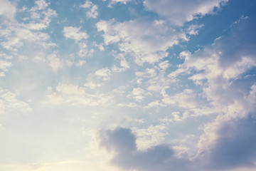 Naklejka na ściany i meble fluffy cloud above blue sky with sunlight in the morning