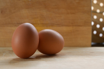 hen egg put on wood cutting board in kitchen prepare cooking