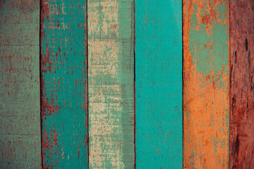 Vintage wood background texture old wood material or Vintage wallpaper colors Patterned of brightly colored panels of weathered painted wooden boards