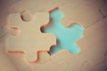 jigsaw puzzle / Close up of jigsaw pieces for joining and  trying to connect business partnership