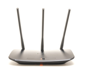 Working router with powering lights and internet connection status isolated on white background. Wireless device with antenna Wi-Fi wireless, broadband