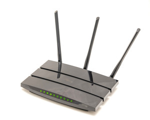 Top view close-up studio shot of black wireless router cable modem isolated on white background....