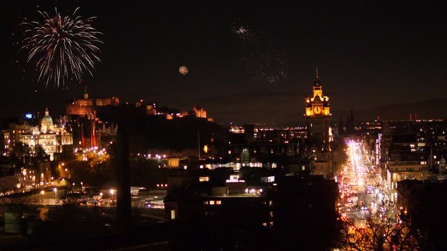4K: Fireworks over the Edinburgh Skyline / Cityscape Princes Street. Perfect for New Year / Hogmanay