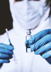 Laboratory scientists are investigating a vaccine against coronavirus. Struggle against epidemics.
