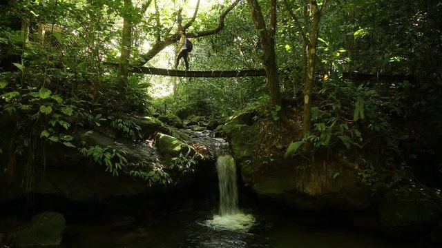 A young woman walking along the Cerro Azul Meambar National Park (Panacam) on Lake Yojoa. Honduras