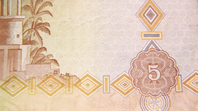 macro stop motion of the United Arab Emirates currency 5 dirhams , 4K UHD video footage.