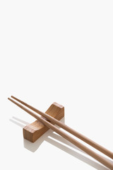 Wooden pairs of chopsticks on white background. cooking culture in Asian countries.