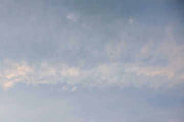 Clouds on blue sky background. Texture of light winter sky.
