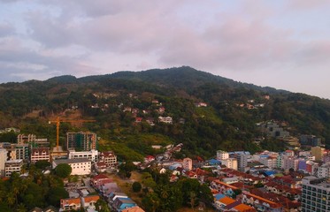 Panoramic Aerial View of Patong Mountains Phuket Thailand with the Sunset creating many beautiful colours
