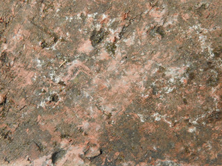 Background and texture of red old vintage brick. Part of the red brick gradually covered by deep green moss. In Taiwan's village, red brick is a common building material.