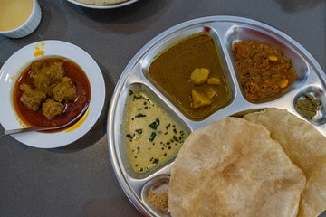 Burmese naan flatbread served with dipping sauces