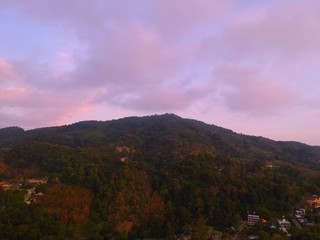 Panoramic Aerial View of Patong Mountains Phuket Thailand with the Sunset creating many beautiful colours