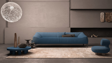 Elegant grunge living room with plaster walls and floor, fireplace. Blue sofa with pillows, carpet, fluffy armchair, side tables, vases, decors. Modern interior design idea