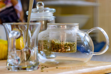 fennel seeds inside glass teapot being brewed for healthy drink