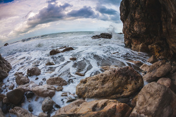 Ocean against the background of the cloudy sky.