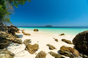 Tropical beach and rocky coastline and beautiful forest. Nyaung Oo Phee Island Myanmar
