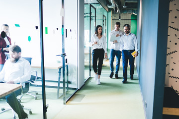 Coworkers chatting on way to office