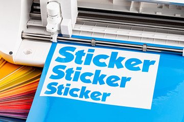 production making sticker with plotter cutting machine cyan blue colored vinyl fim with color fan....