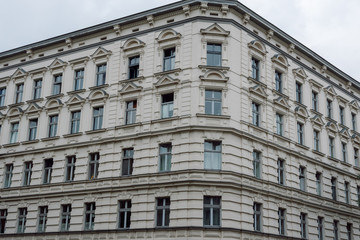 Fototapeta na wymiar Corner facade of an old building, Prenzlauer Berg, Berlin, Germany.