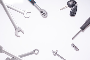 New keys on a white background, top view with space for text. Plumber