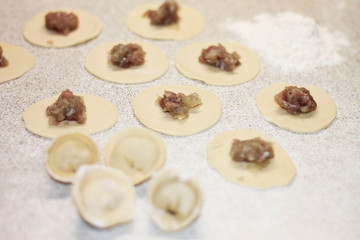 Dumplings  with meat a delicious and satisfying dish with your own hands