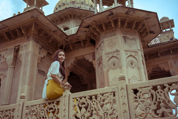Woman posing in Gaitore Ki Chhatriyan in Jaipur, India
