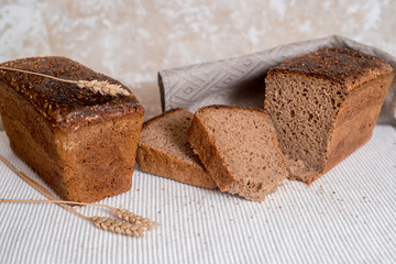 freshly baked sliced bread on rustic wooden table