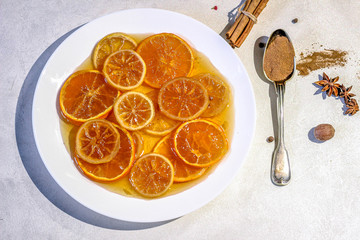 Cramalized oranges with spices. Mulled wine seasonings