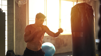 Young man boxing workout - Powered by Adobe