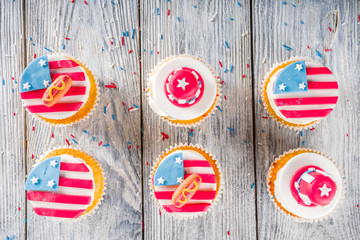 Independence Day July 4 congratulations background. Veterans Day. American Constitution holiday. USA American tradition greeting card. Patriotic home cupcakes with americas symbols decor © ricka_kinamoto
