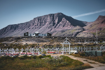 View over colourful greenland houses of Disko Island, arctic city of Qeqertarsuaq. Located in the...