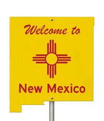 Welcome to the state of New Mexico road sign in the shape of the state map with the flag