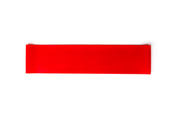 Red fitness elastic band for sport isolated on white background.
