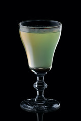 Glass of daiquiri cocktail isolated on black background
