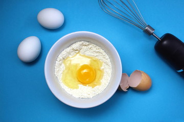 Preparation for the cake on a blue background
