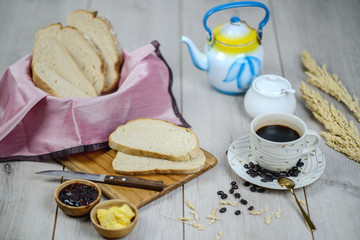 Brown Bread with a cup of black coffee