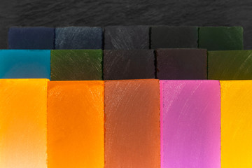 Background composition of rough and faceting luxurious stone raw materials rectangles