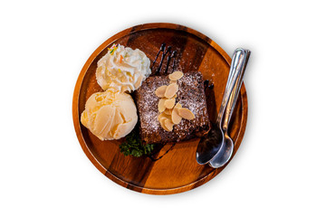 isolate and cliping path Brownies icecream on wood plate.