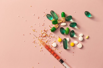 Syringe and various pills