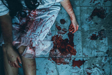 Fototapeta na wymiar Murdered women's hand lying on the ground.