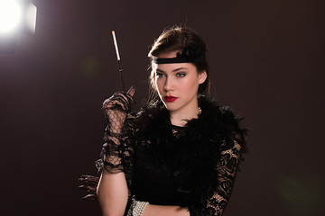 Roaring twenties poster flapper party girl, vintage 20s fashion style and make up and hairstyle,...