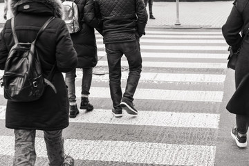 people at a pedestrian crossing