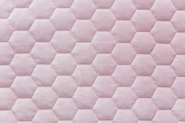 Pink color hexagon mesh fabric textured background