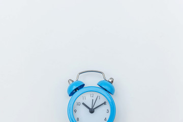 Simply flat lay design Ringing twin bell vintage classic alarm clock Isolated on white background....