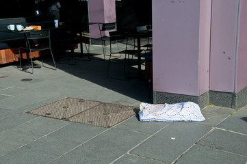 Pillow of a homeless laid on a street