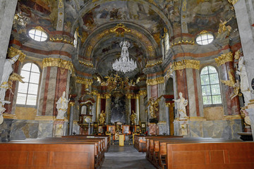 Obraz premium Church of St. Catherine of Alexandria in Prague. Church tower Catherine is visible from afar and looks like a thin minaret of a Muslim mosque. Frescoes inside the church.